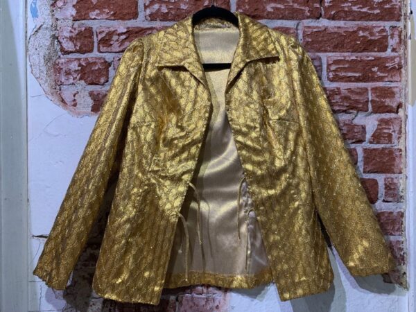 product details: AS-IS 1960S METALLIC GOLD BLAZER WITH VEILED FISHNET OVERLAY AND DOUBLE FRONT TIE CLOSURE photo