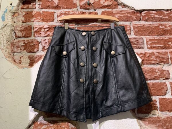 product details: ADORABLE Y2K FAUX LEATHER MINI SKIRT WITH QUILTED STITCHING AND DOUBLE FRONT BUTTON FAUX CLOSURE photo