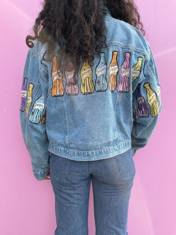 product details: ADORABLE CROPPED DENIM JACKET WITH ALLOVER EMBROIDERED SODA BOTTLE PATCHES photo