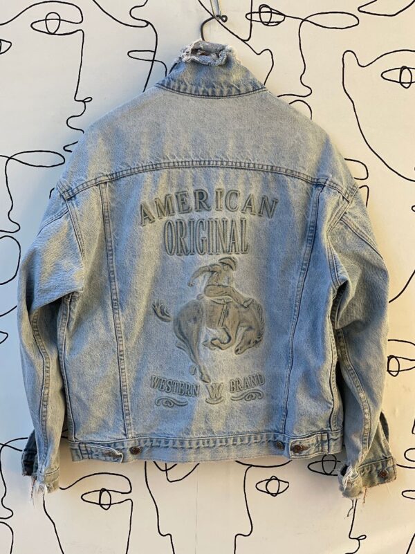 product details: AS-IS AWESOME LIGHT WASH EMBOSSED BRANDED DENIM JACKET WITH RODEO COWBOY photo