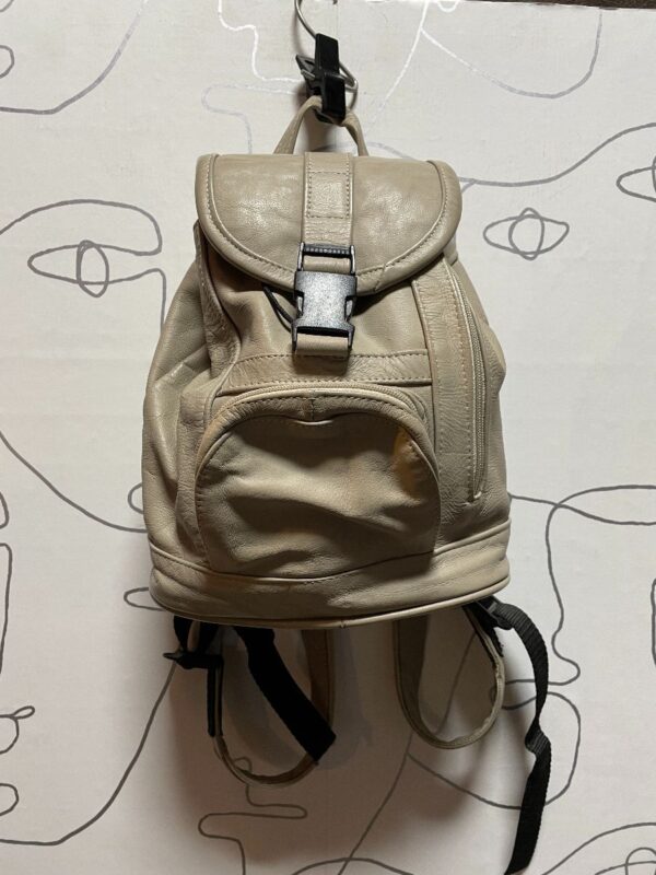 product details: SMALL LEATHER BACKPACK METAL BUCKLE FRONT photo