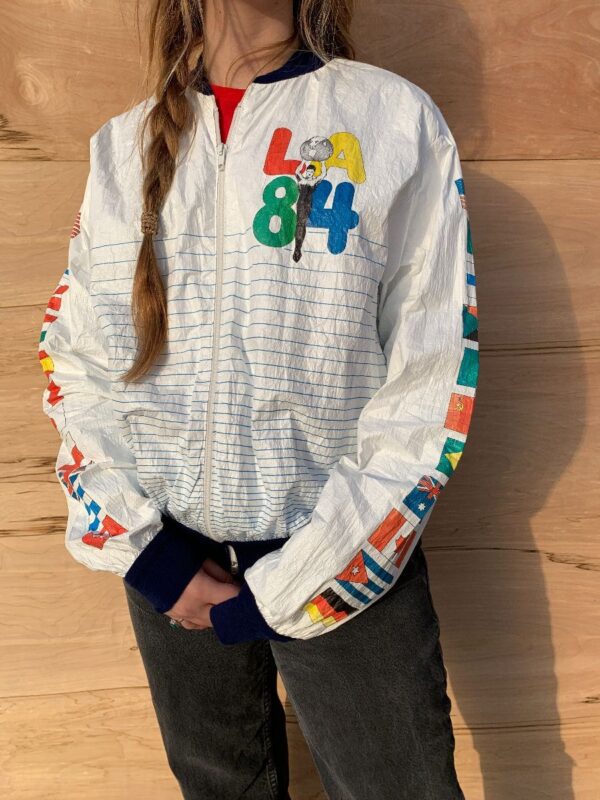 product details: RAD LOS ANGELES 84 SUMMER OLYMPICS TYVEC PAPER THIN  ZIP-UP JACKET photo