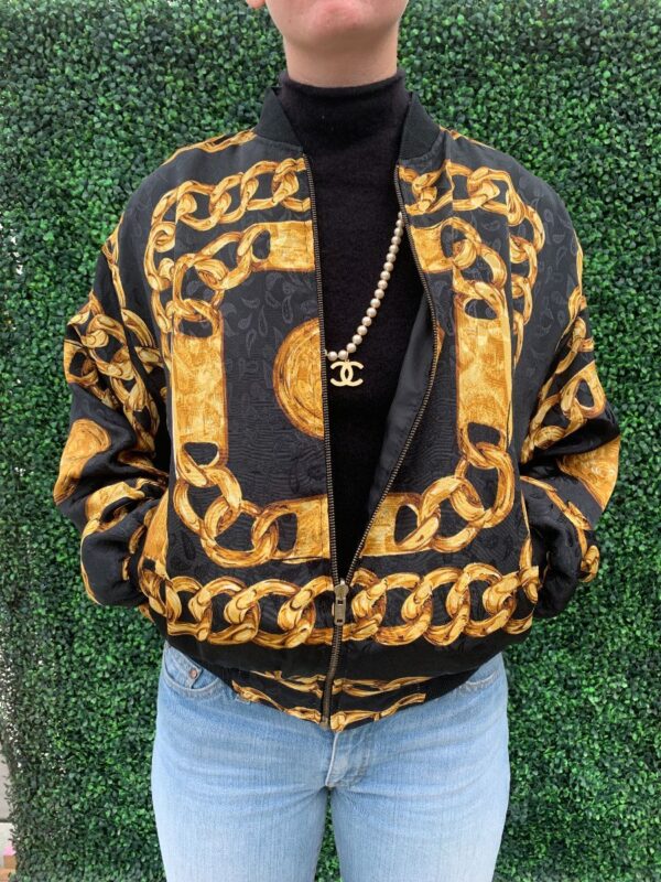 product details: 1980S REVERSIBLE CHANEL STYLE ALL OVER GOLD CHAIN LINK GRAPHIC BOMBER JACKET W/ SHOULDER PADS photo