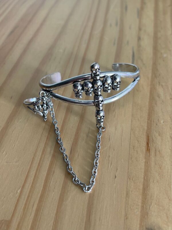 product details: MULTI SKULL CROSS DOUBLE BAR CUFF W/ CHAIN LINKED RING photo