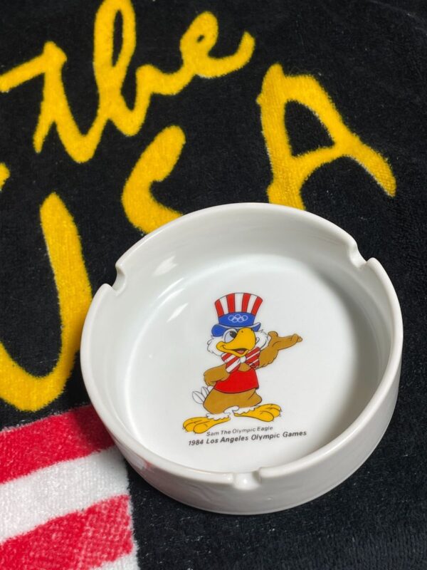 product details: OLYMPIC GAMES SAM THE OLYMPIC EAGLE ASHTRAY 1984 photo