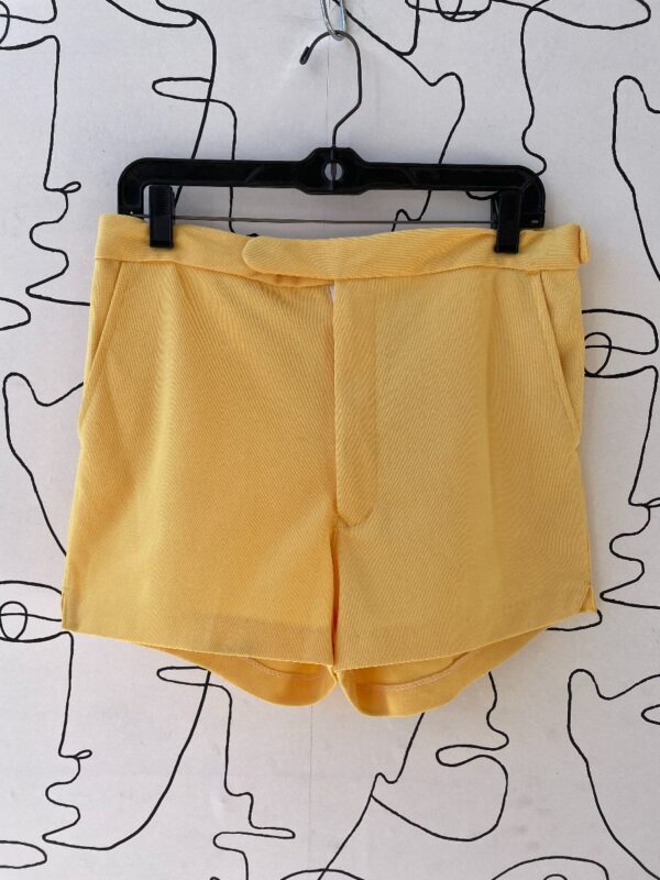 product details: 100% POLYSTER SOLID TENNIS SHORTS photo