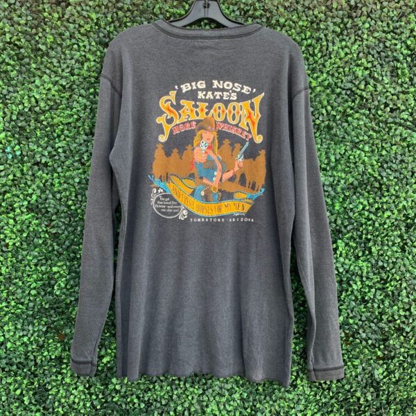 product details: RAD FADED AND SOFT LONG SLEEVE HENLEY SHIRT BIG NOSE KATES SALOON GRAPHIC photo