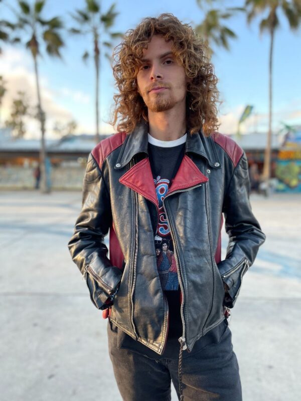 product details: VINTAGE LEATHER MOTO JACKET W/ RED LEATHER PANELS AND COLLAR photo