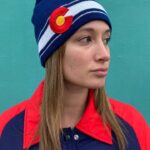 KNIT BEANIE WITH HORIZONTAL BOTTOM STRIPE AND LARGE EMBROIDERED COLORADO EMBLEM