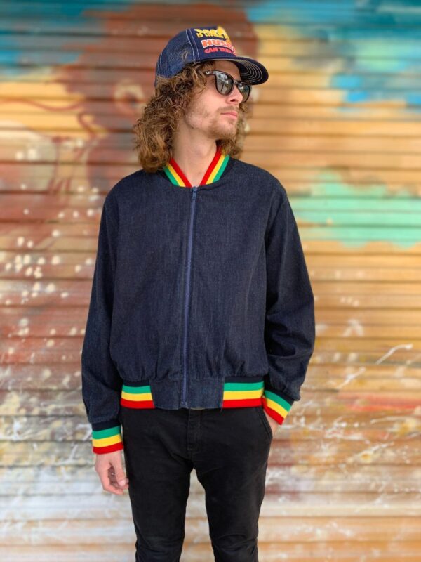 product details: LIGHTWEIGHT DENIM STYLE ZIP UP JACKET WITH RASTA COLORED CUFFS AND COLLAR photo