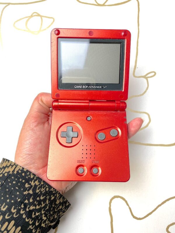 product details: NINTENDO GAME BOY ADVANCE SP HANDHELD SYSTEM - FLAME RED *WORKS photo