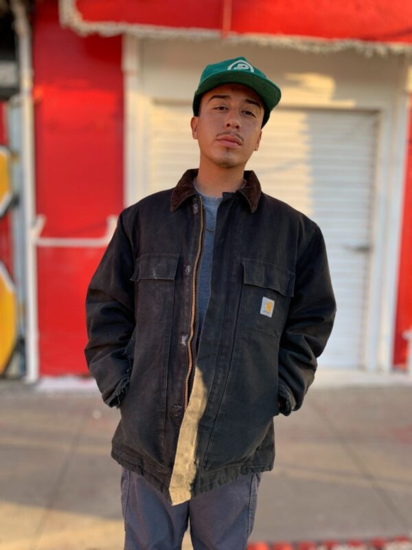 product details: AS-IS SUPER DISTRESSED CARHARTT WORK WEAR CANVAS JACKET WITH CORDUROY COLLAR photo