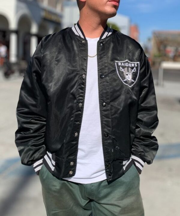 product details: NFL LOS ANGELES RAIDERS SATIN BUTTON UP JACKET W/ SPELLOUT LETTERS ON BACK AS-IS photo