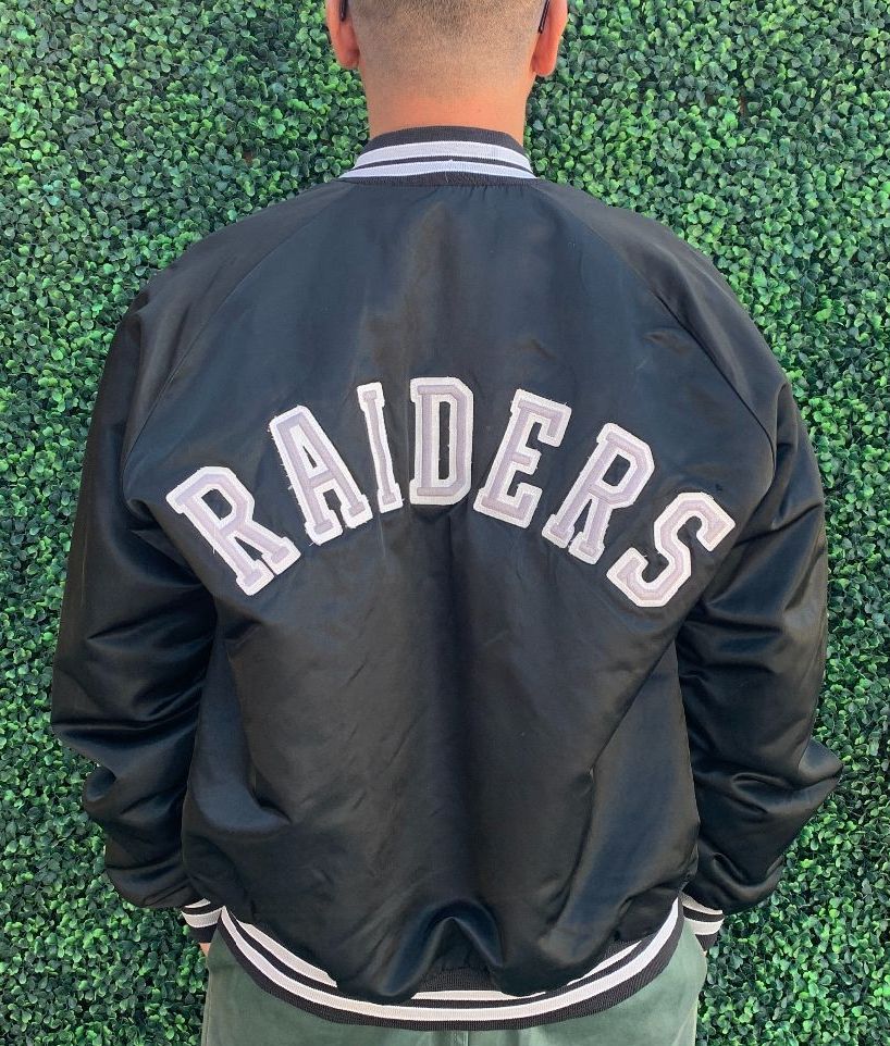 NFL LOS ANGELES RAIDERS SATIN BUTTON UP JACKET W/ SPELLOUT