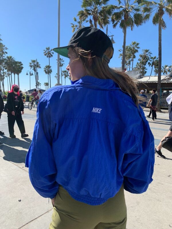 product details: 1980S NIKE CROPPED SMALL FIT WINDBREAKER W/ EMBROIDERED LOGO ON BACK SHOULDER PADS photo