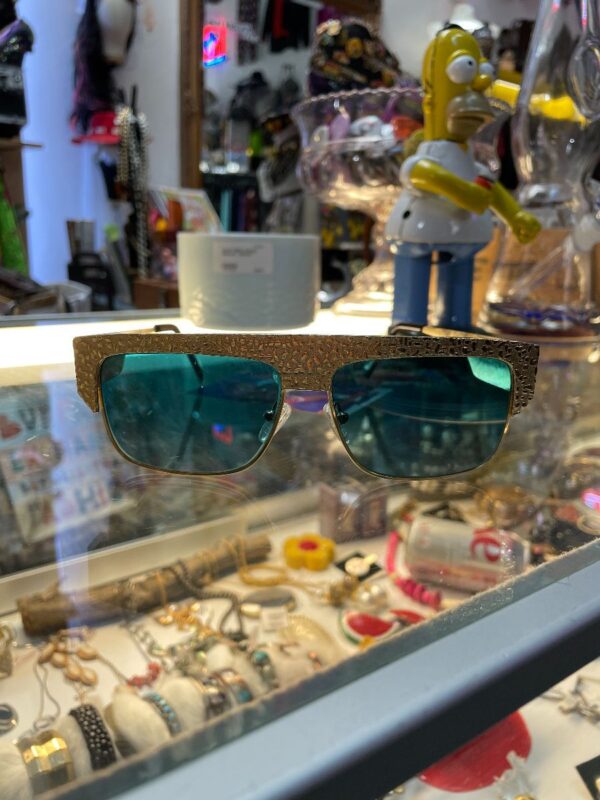 product details: RAD CUSTOMIZED 1980S DEADSTOCK STRAIGHT BROW GOLD NUGGET BLUE TINTED SUNGLASSES photo