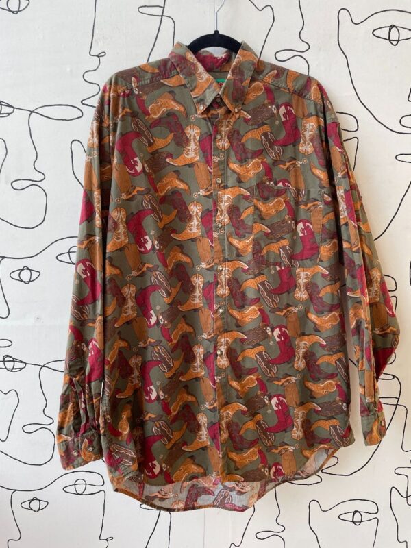 product details: 1990S LONG SLEEVE BUTTON DOWN SHIRT ALLOVER COWBOY BOOT PRINT photo