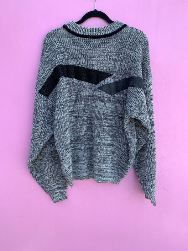 product details: 1980S SLOUCHY KNIT SWEATER WITH DIAGONAL LEATHER APPLIQUE 100% ACRYLIC photo