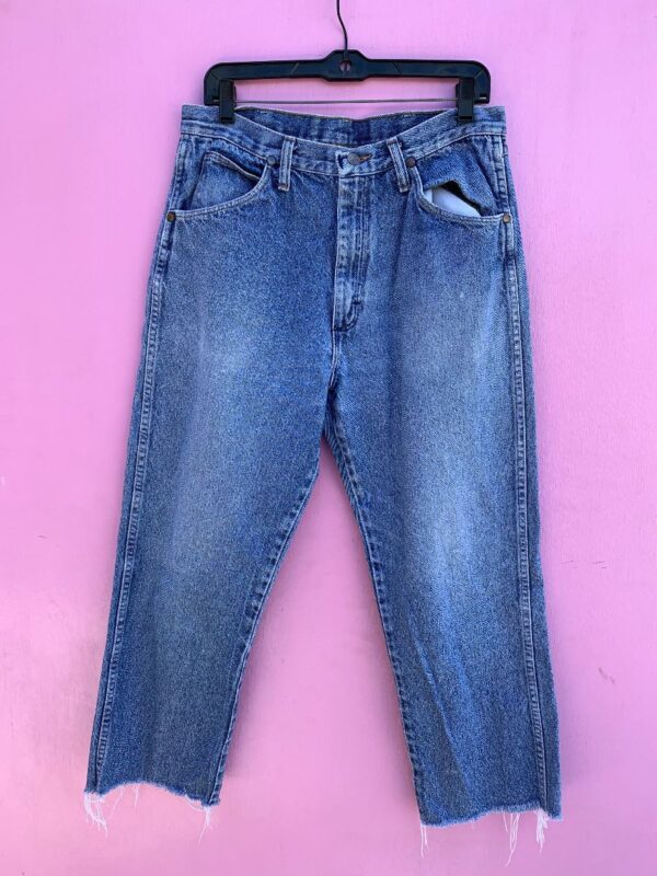 product details: CLASSIC WRANGLER JEANS WITH CUT OFF & FRAYED BOTTOM HEM AS-IS photo