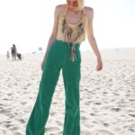 AS-IS 1970S HIGH RISE GREEN CORDUROY FLARES WITH FUN YOKE DETAILS