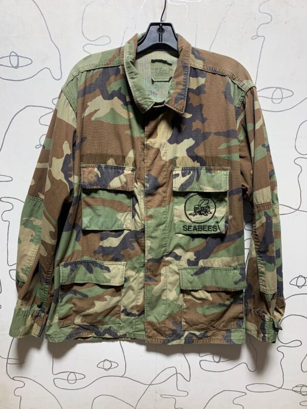 product details: LS BD CAMOFLAUGE JACKET W/ SEABEES EMBROIDERED POCKET photo
