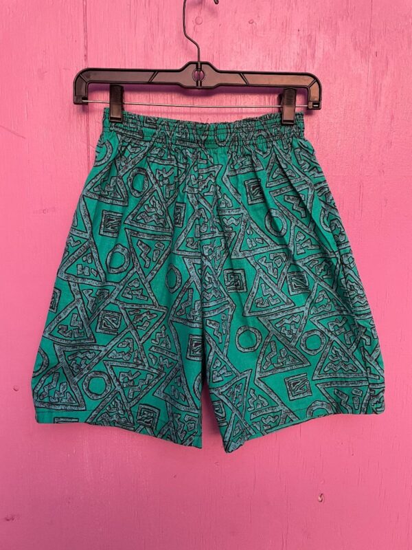 product details: 1980S DEADSTOCK FUNKY TRIBAL PRINT BOARD SHORTS W/ ELASTIC WAIST SMALL FIT photo