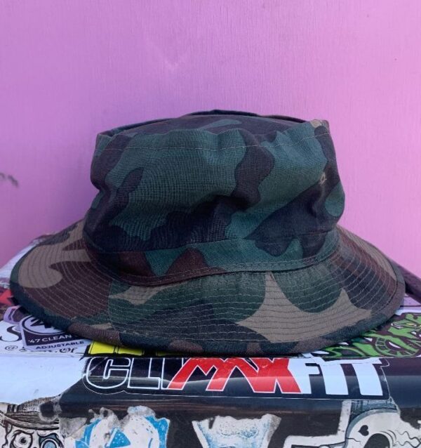 product details: CAMOUFLAGE BUCKET HAT photo
