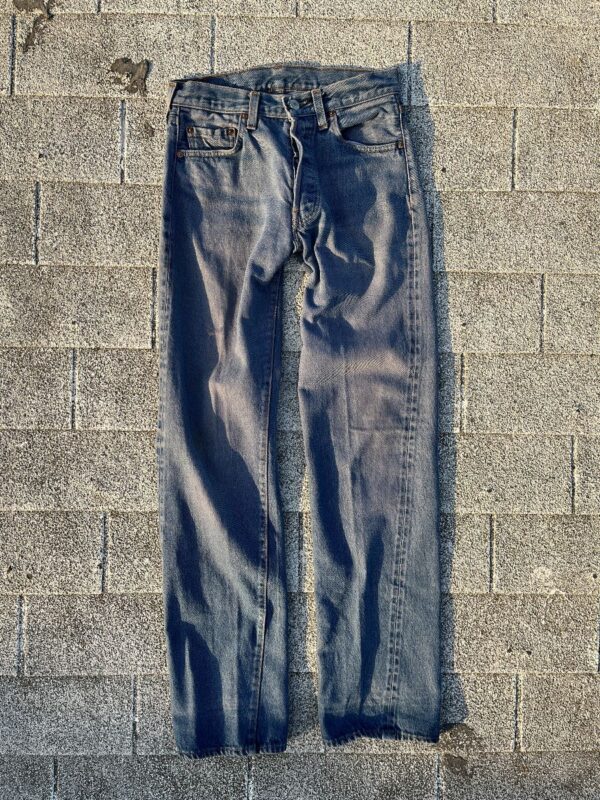 product details: STONE WASHED BUTTON FLY SOFT SELVEDGE DENIM JEANS photo