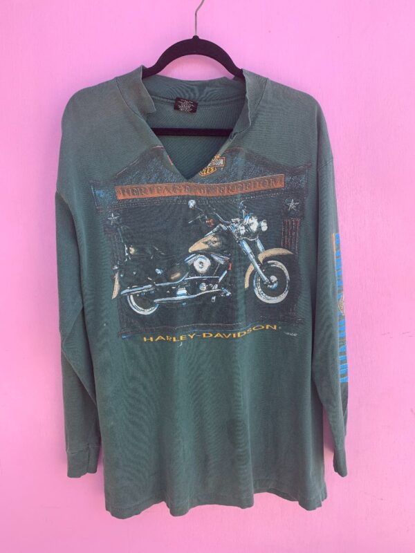 product details: DISTRESSED HARLEY DAVIDSON MOTORCYCLE HERITAGE OF FREEDOM LONG SLEEVE T-SHIRT W/ CUT NECK AS-IS photo