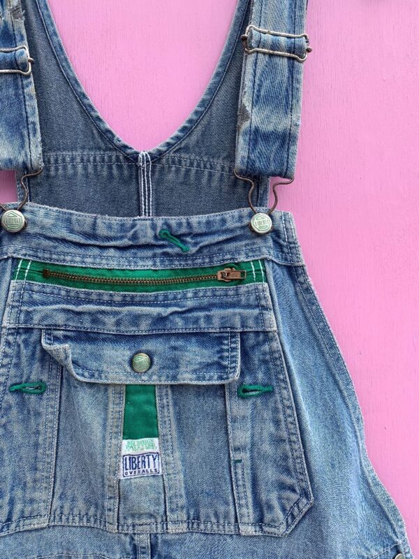 product details: OVERALS W/ GREEN STITCHING HAS ZIPPERS AND POUCHES + BLUE PAINT  SPLATTER photo