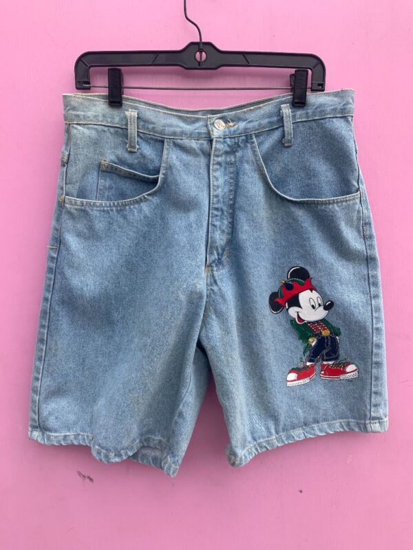 product details: 1990S LIGHT WASH DENIM SHORTS W/ PIMPED OUT MICKEY GRAPHIC AS-IS photo