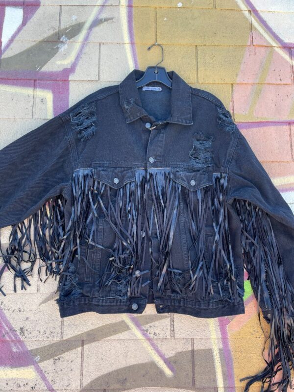 product details: REWORKED OVERSIZED & DISTRESSED BLACK DENIM JACKET W/ FAUX LEATHER FRINGE photo