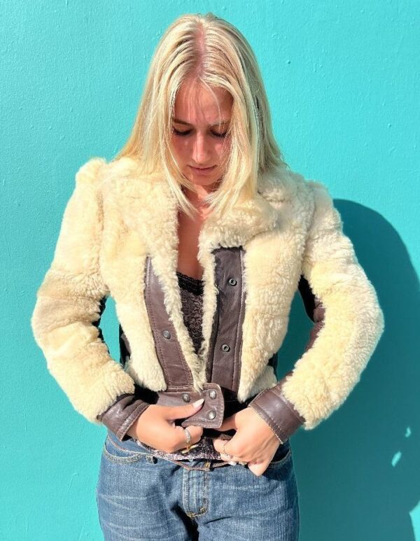 product details: UNREAL 1970S CROPPED SHEEPSKIN AND LEATHER PANELED JACKET photo