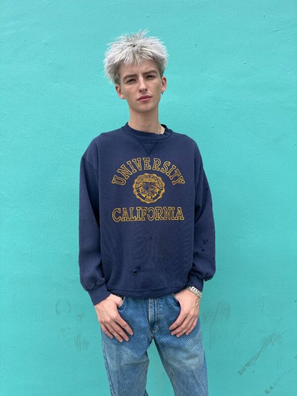 product details: PERFECTLY THRASHED UNIVERSITY OF CALIFORNIA CREWNECK PULLOVER SWEATSHIRT AS-IS photo