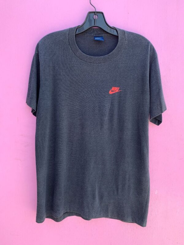 product details: CLASSIC NIKE BLUE TAG SINGLE STITCH T-SHIRT W/ SMALL SWOOSH AND LOGO ON CHEST photo