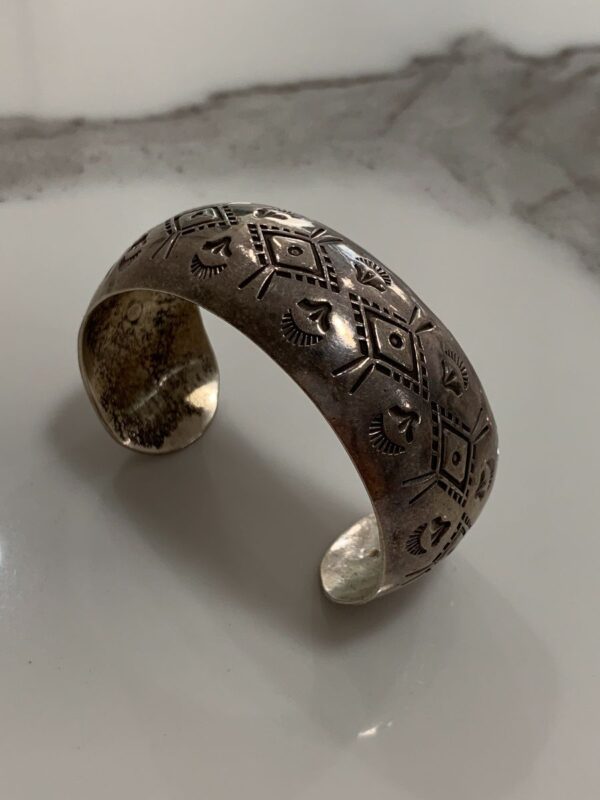product details: NAVAJO WIDE STERLING SILVER CUFF BRACELET SOUTHWESTERN NATIVE DESIGN STAMPING STAMPING SIGNED W.TRACY photo