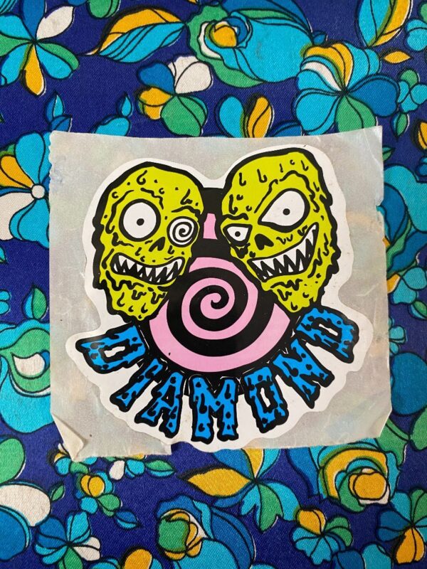 product details: VINTAGE DIAMOND STICKER W/ SLIME HEADS AND SWIRL photo