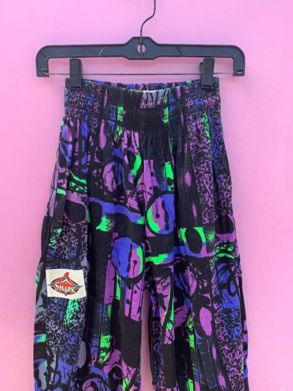 product details: 1990S DEADSTOCK ABSTRACT GEOMETRIC HAMMER PANTS W/ DAY GLO COLORS photo