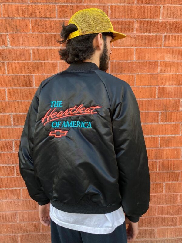 product details: DUAL SIDED THE HEARTBEAT OF AMERICA EMBROIDERED SNAP UP BOMBER JACKET photo