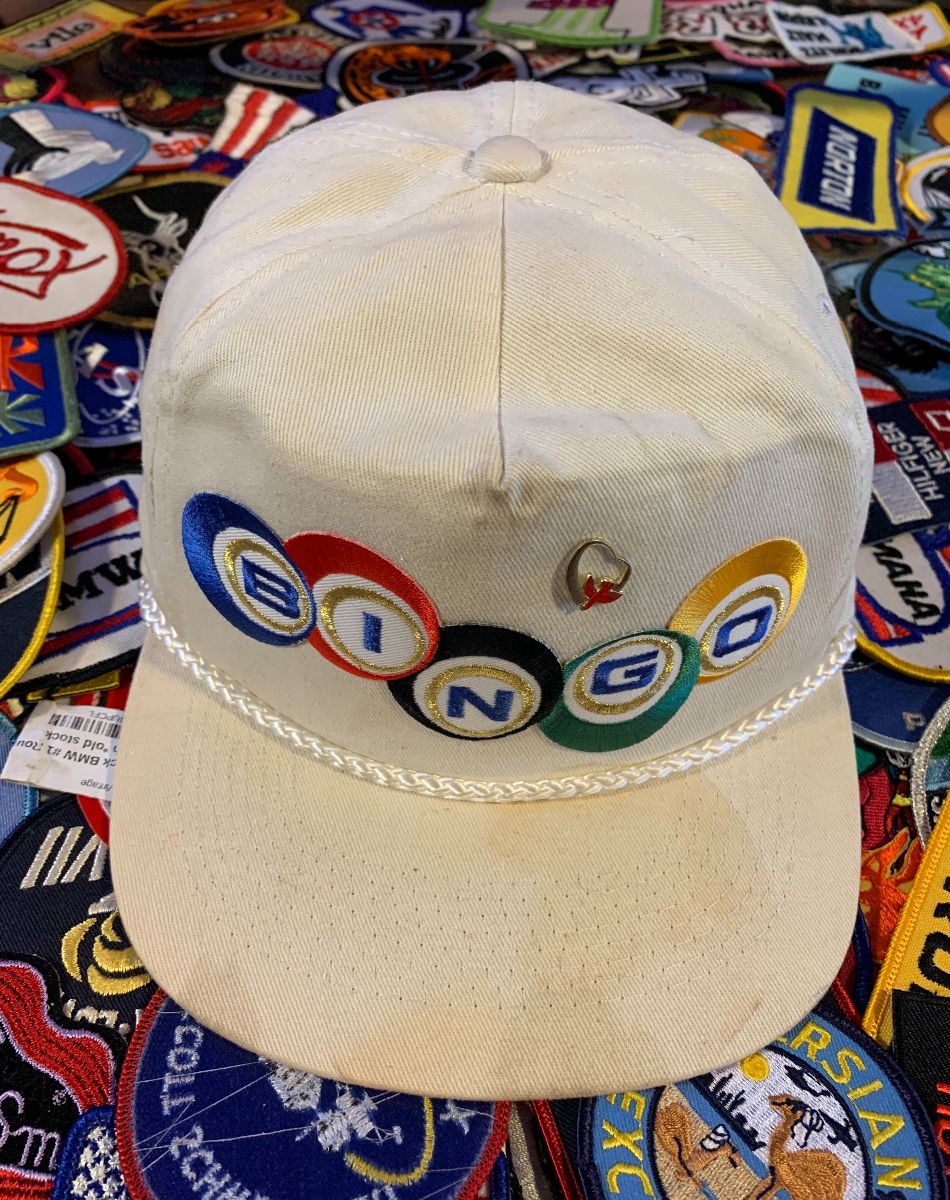 product details: AS-IS EMBROIDERED BINGO SNAPBACK HAT WITH ENAMELED SPARROW PIN photo