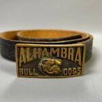 NARROW CUT EMBOSSED & TOOLED FLORAL DESIGNED LEATHER BELT BRONZE ALHAMBRA BULL DOGS RECTANGULAR BUCKLE