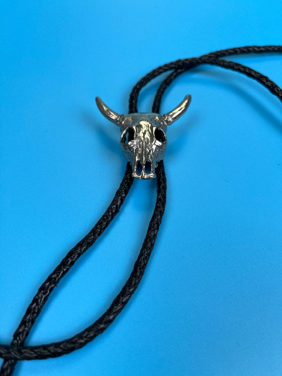 product details: CLASSIC COW STEER SKULL WESTERN BOLO TIE WOVEN LEATHER BOLERO CORD photo