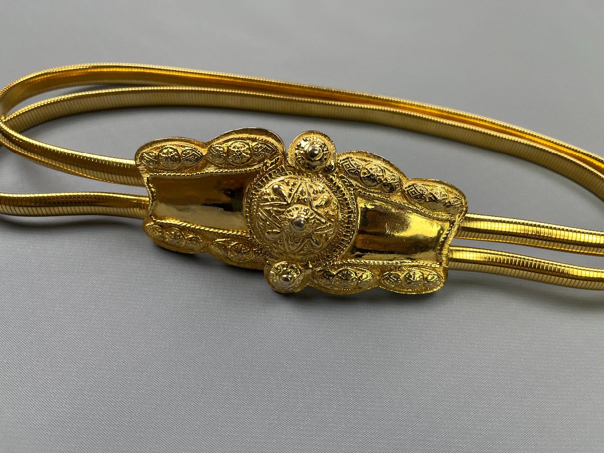 product details: 1980S PLATED GOLD ORNATE DOUBLE CLASP STRETCH WAIST BELT photo