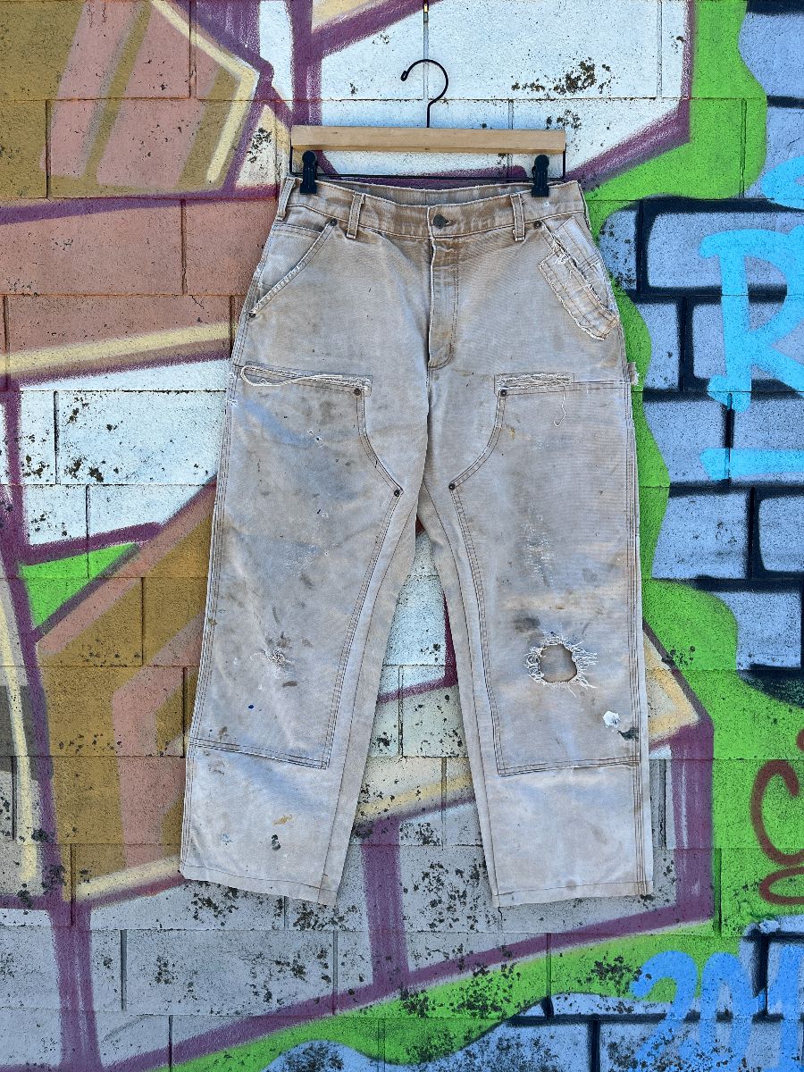 product details: *AS-IS* RAD! FADED & HEAVILY DISTRESSED CARHARTT DOUBLE KNEE DENIM WORKWEAR CARPENTER PANTS photo
