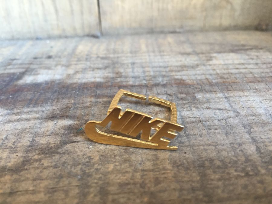 product details: HAMMERED GOLD NIKE RING HAMMERED SQUARE BASE photo