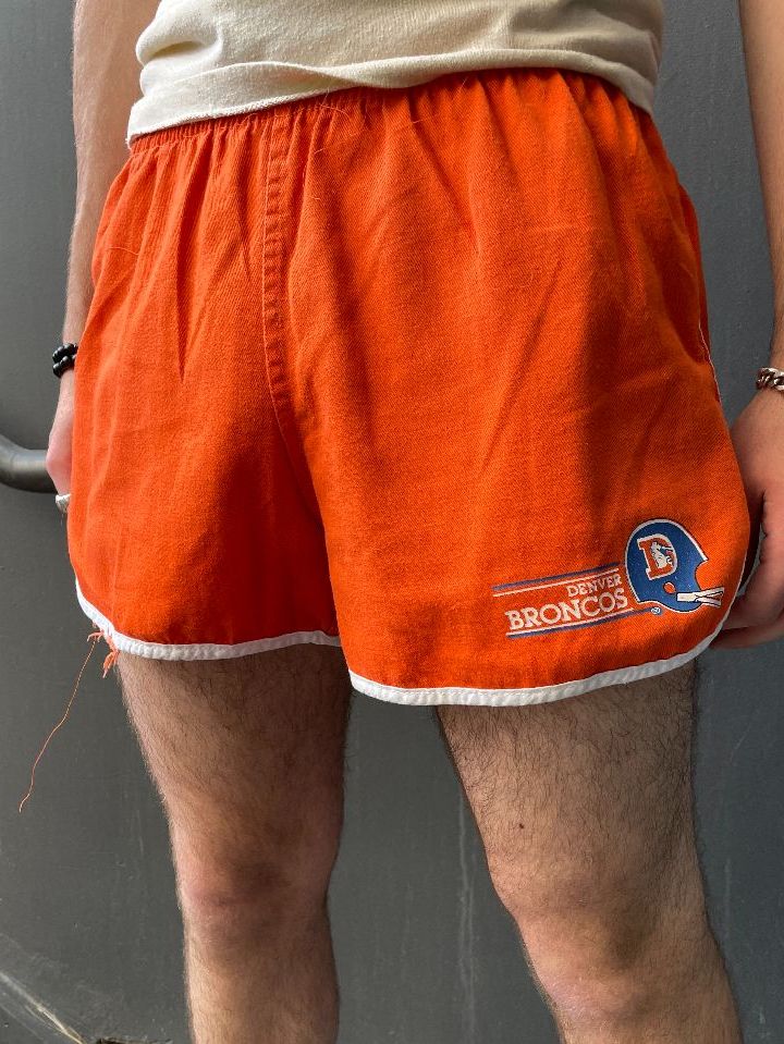 product details: *AS-IS* RAD! 1970S CHAMPION BLUE BAR DENVER BRONCOS GRAPHIC COTTON TRACK SHORTS WHITE BINDING photo