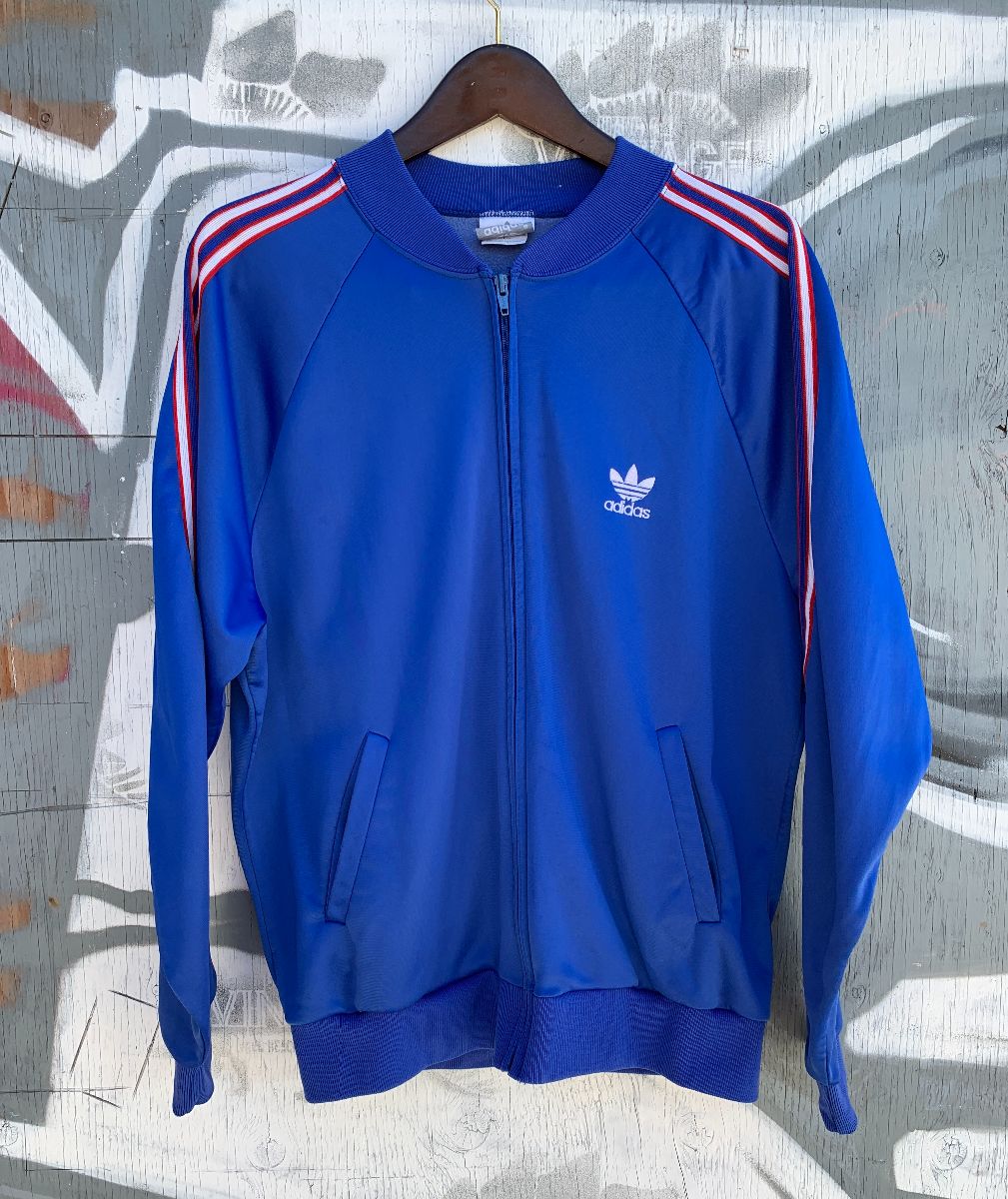 product details: MADE IN USA ADIDAS BLUE ZIP UP TRACK JACKET RED STRIPED SLEEVES photo