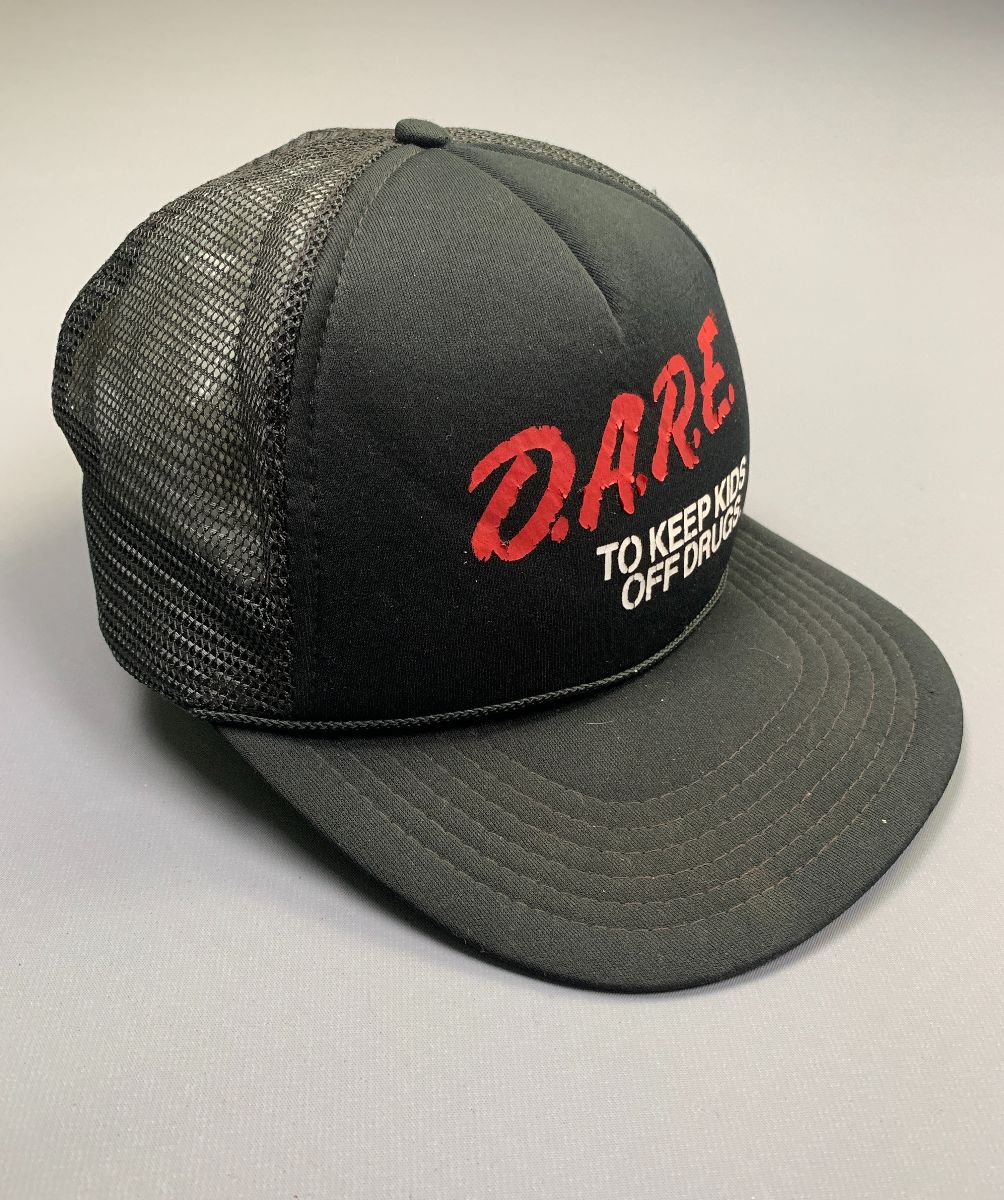 product details: AS-IS DARE TO KEEP KIDS OFF DRUGS SILK SCREEN TRUCKER HAT photo