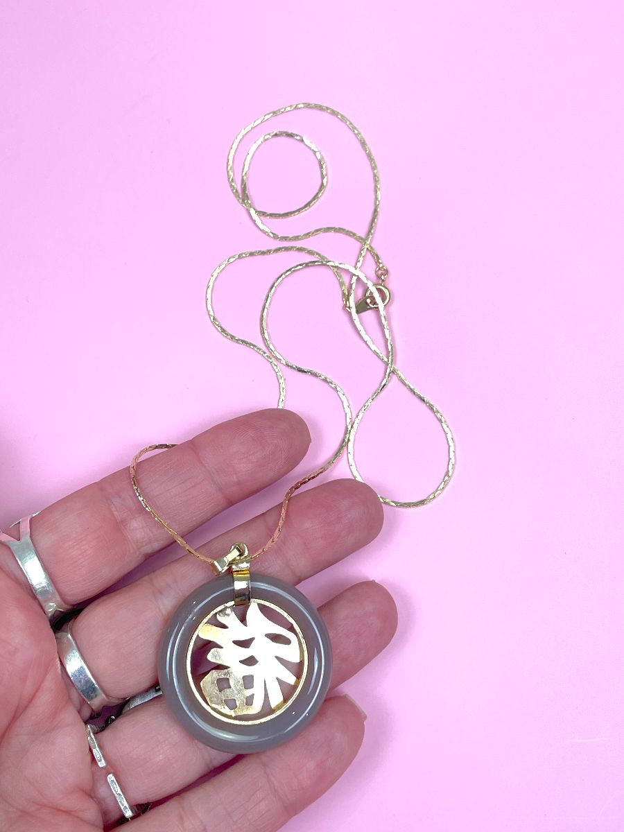 product details: POLISHED STONE WRAPPED CHINESE SYMBOL PENDANT NECKLACE GOLD SNAKE CHAIN photo