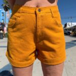 *AS-IS* 1990S OVERDYED HIGH WAISTED ROLLED HEM MUSTARD DENIM SHORTS